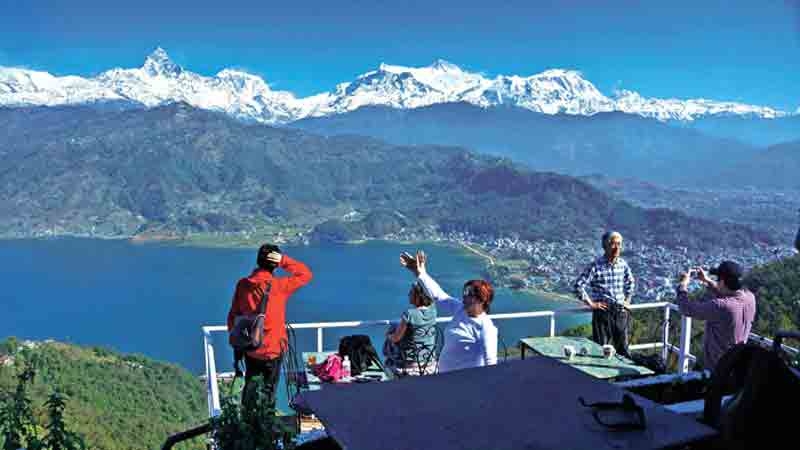 Local family enjoying a view in Pokhara